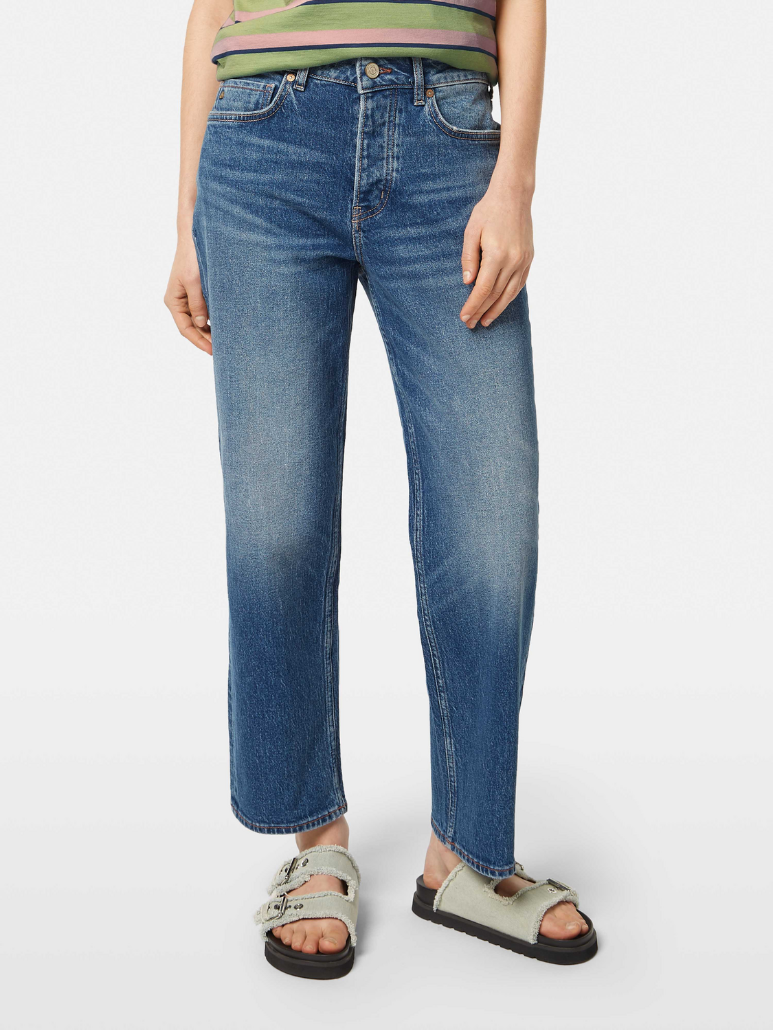 Sky straight-fit denim jeans by Scotch & Soda, featuring classic five-pocket design and light wash, shown on a model.
