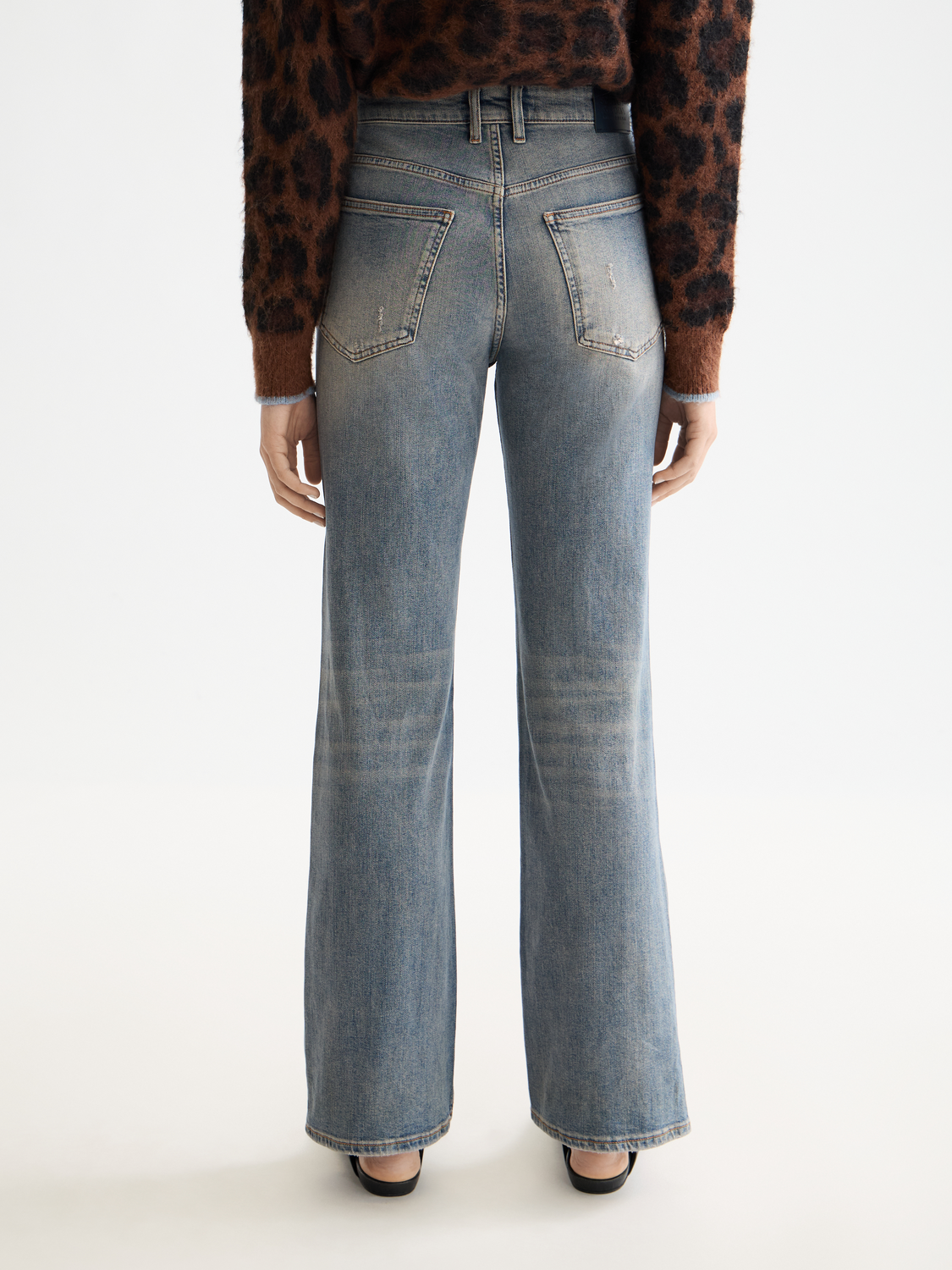 SCOTCH & SODA Glow bootcut denim jeans in a classic blue wash with a flattering flared leg silhouette