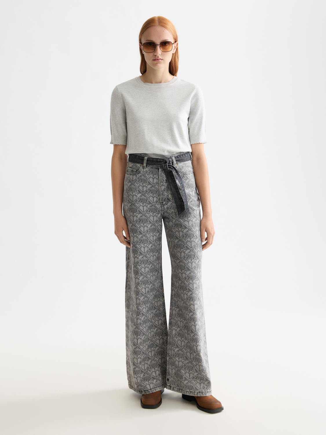 Wave wide-fit denim jeans by Scotch & Soda, shown in a front view with classic five-pocket design and faded wash finish.