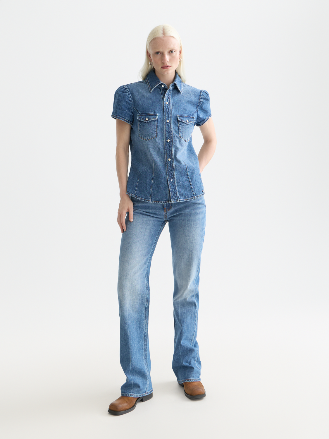 Glow bootcut denim jeans by Scotch & Soda, showcasing a classic fit with a stylish dark wash and subtle fading details.