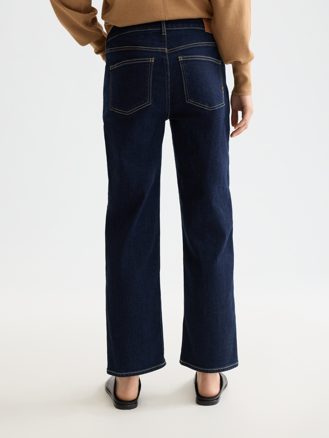 Sky straight-fit denim jeans by Scotch & Soda, showing the back view with classic stitching and fit detail.