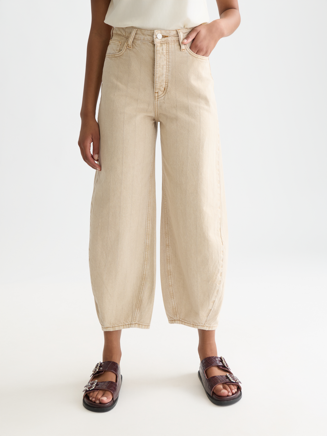 Blue denim Loop barrel leg jeans by Scotch & Soda, featuring a relaxed fit and classic five-pocket design.
