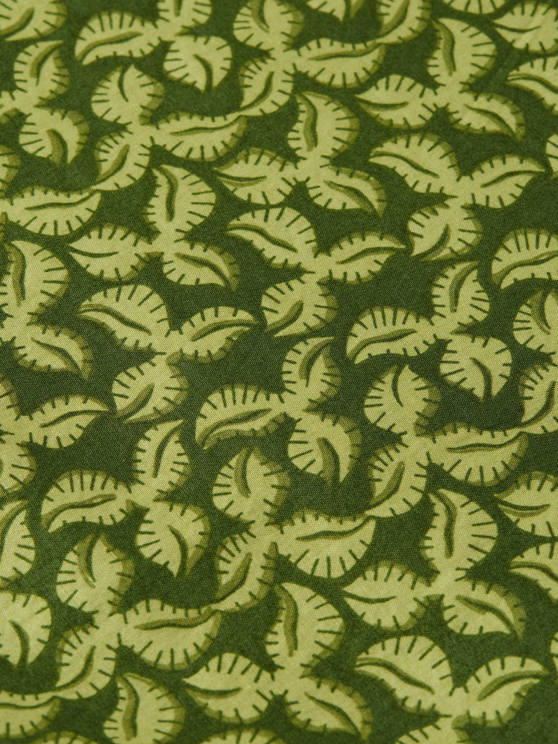 Printed shorts from Scotch & Soda featuring vibrant patterns and casual fit, perfect for summer or relaxed outings.