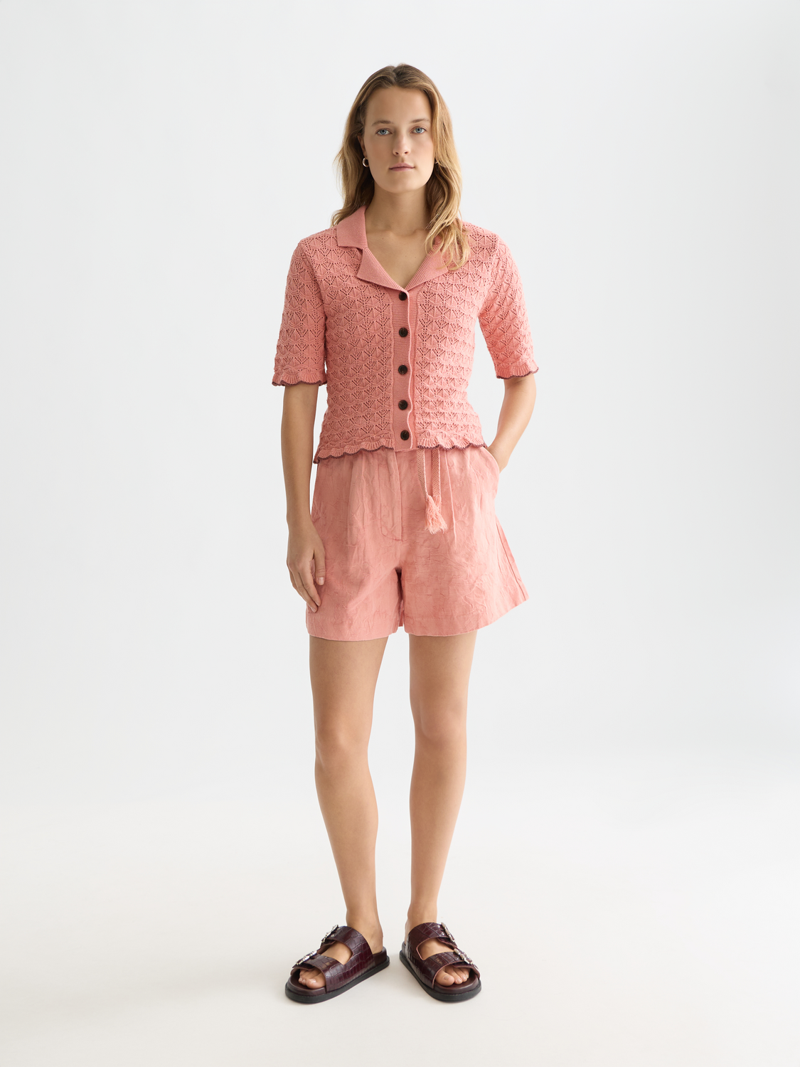 Scotch & Soda jacquard shorts with intricate woven patterns, tailored fit, and stylish design for casual wear.