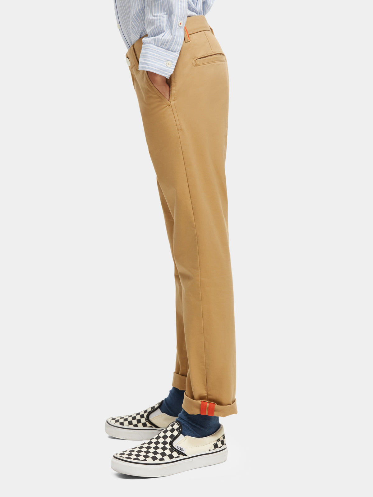 Slim-fit classic chino pants by Scotch & Soda, showing a tailored fit in neutral fabric with front pockets and belt loops.