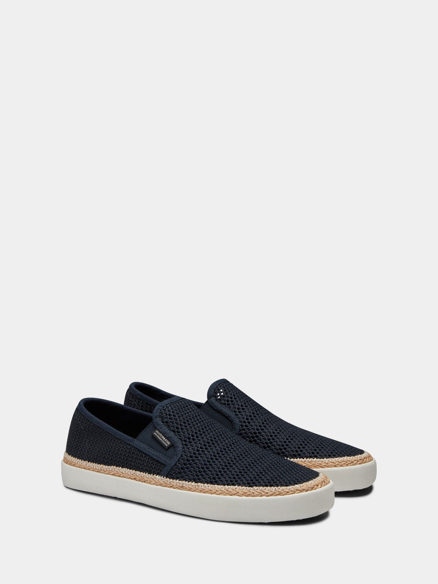 SCOTCH & SODA Izomi slip-on shoe, stylish footwear with a sleek design and comfortable fit, shown in a close-up image.