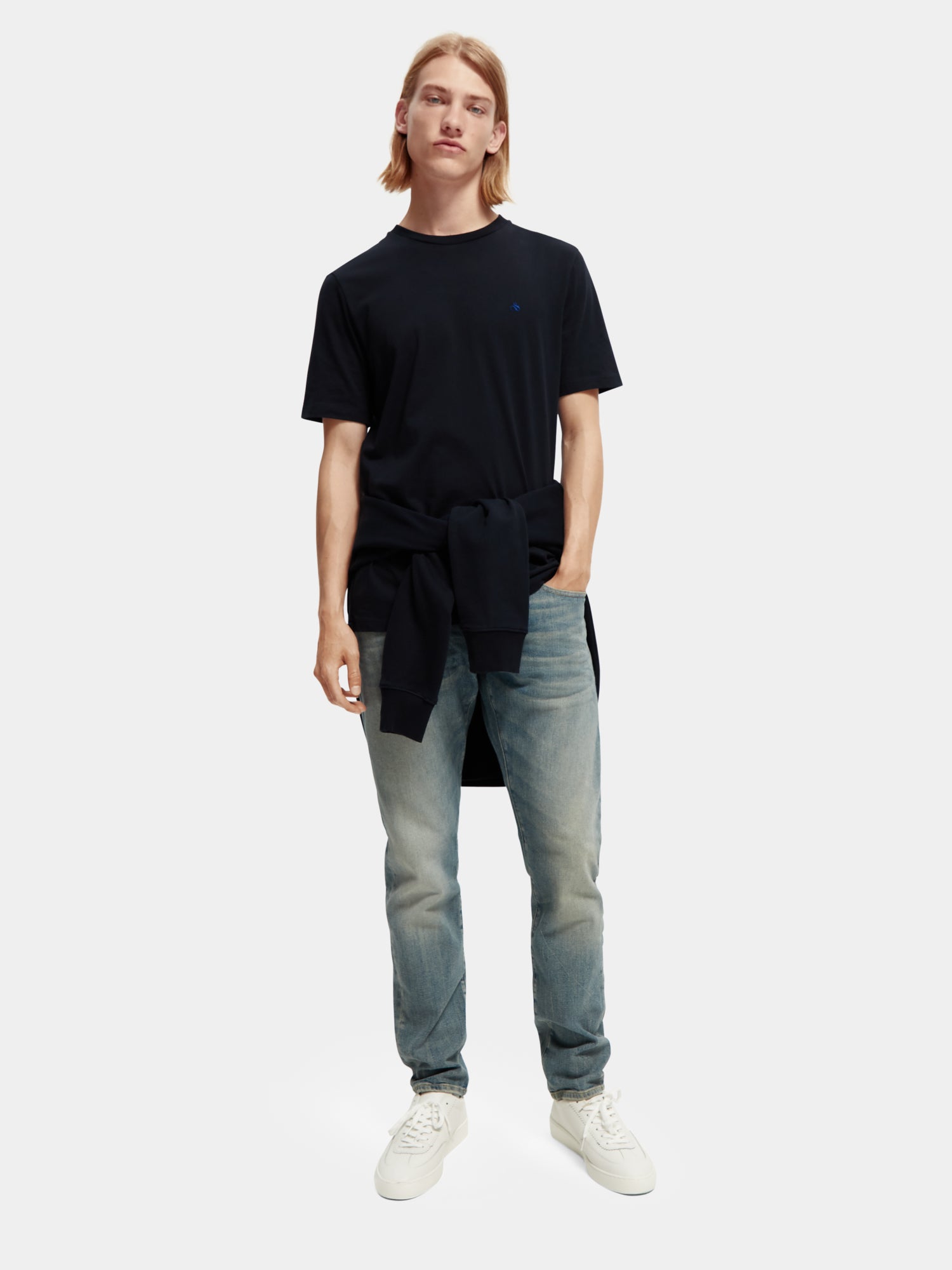 Light beige Scotch & Soda short-sleeve jersey T-shirt with crew neckline, displayed flat on a neutral background.