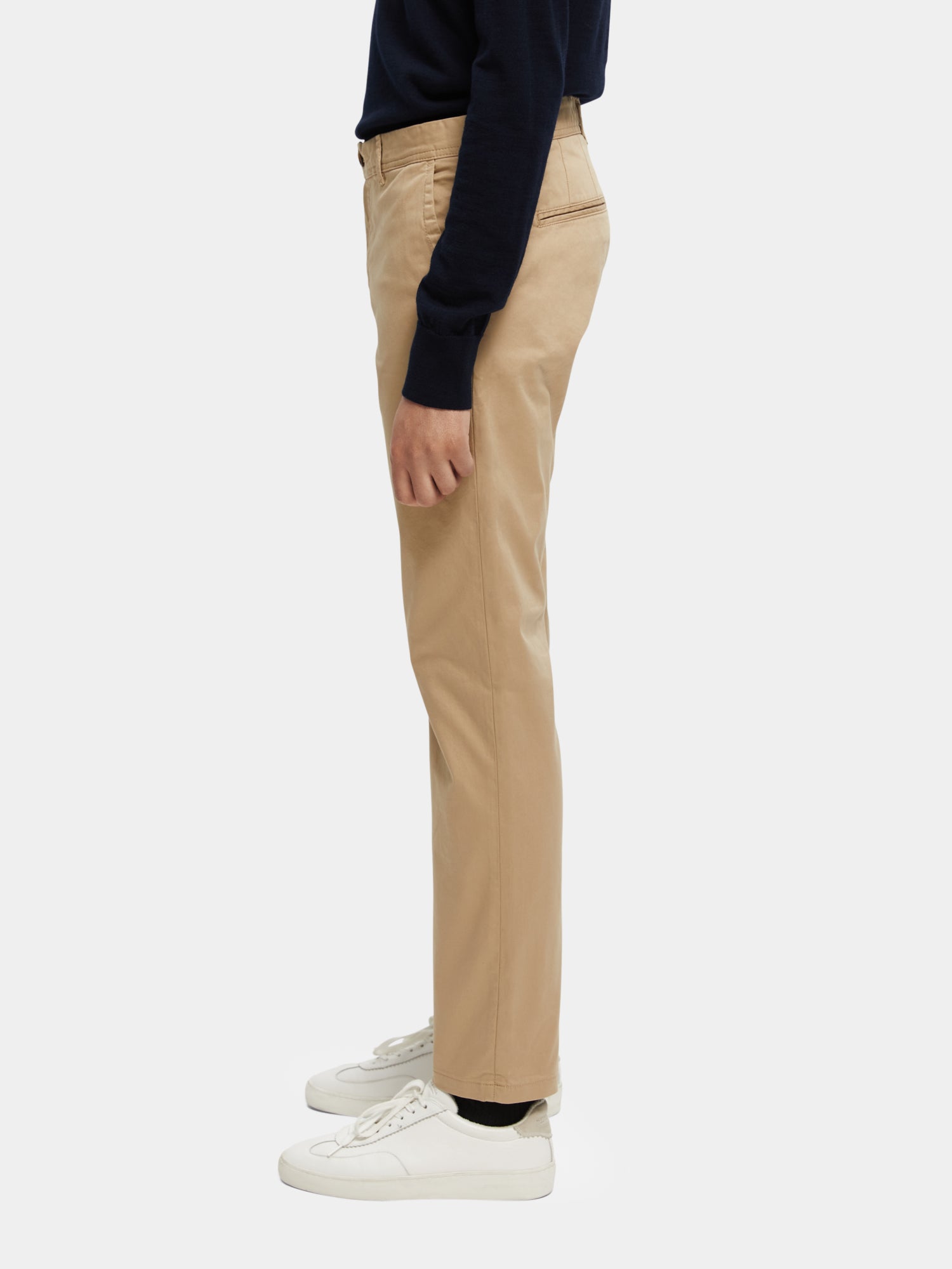Slim fit Scotch & Soda Stuart chinos pants in neutral color, shown with front and side view, featuring classic pocket details.