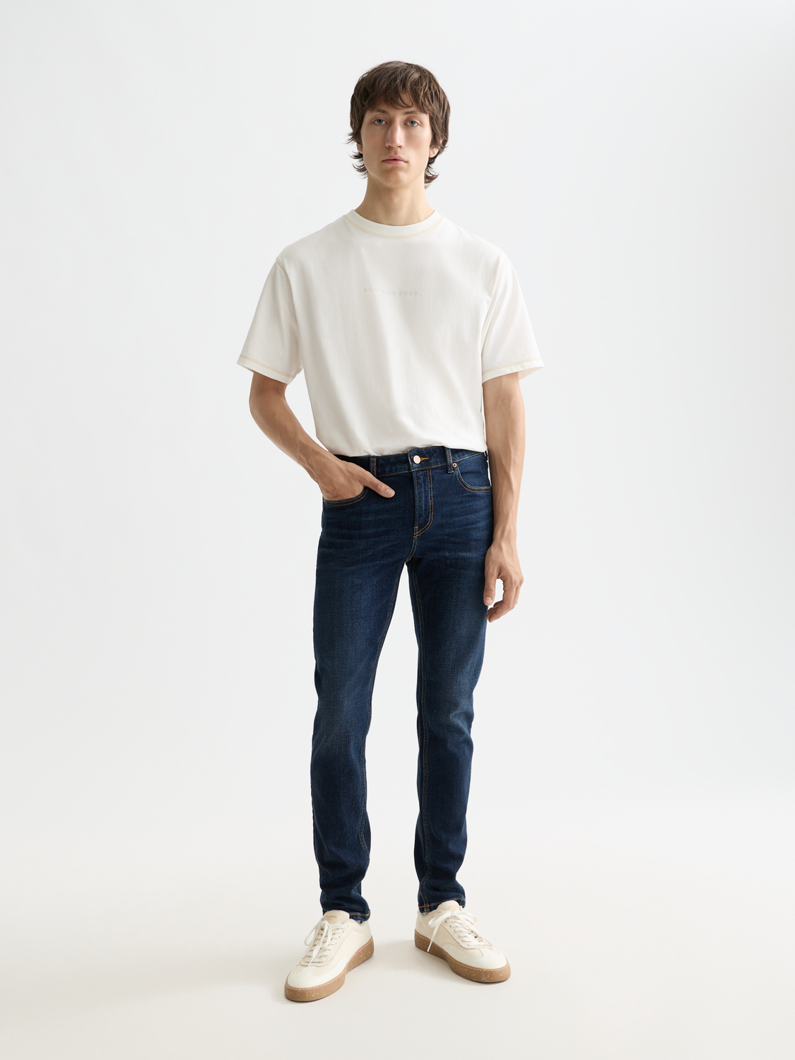 Slim fit denim jeans by Scotch & Soda, featuring a modern skim skinny fit in classic blue denim fabric.