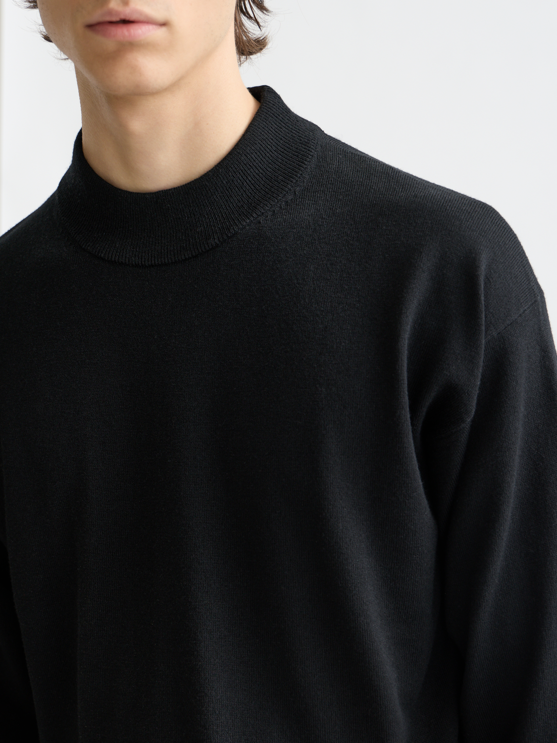 Scotch & Soda knitwear mock neck sweater with ribbed collar and textured fabric, shown in a neutral color.