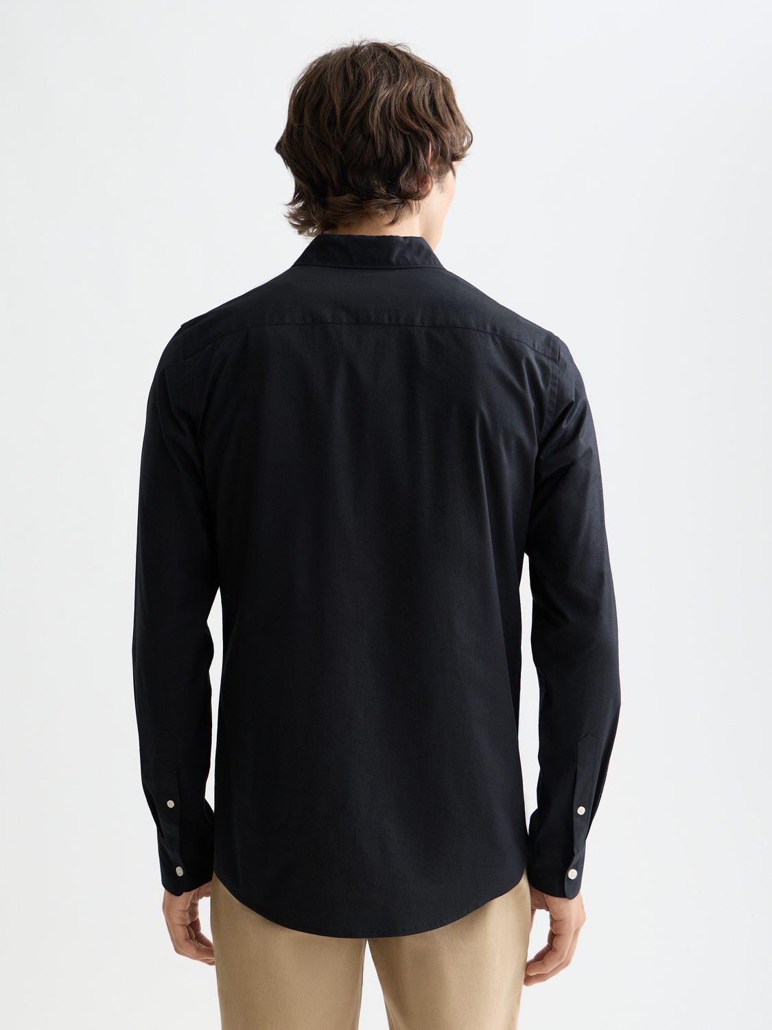 Long sleeve poplin shirt by Scotch & Soda, shown in dark blue with a classic collar and button-front design.