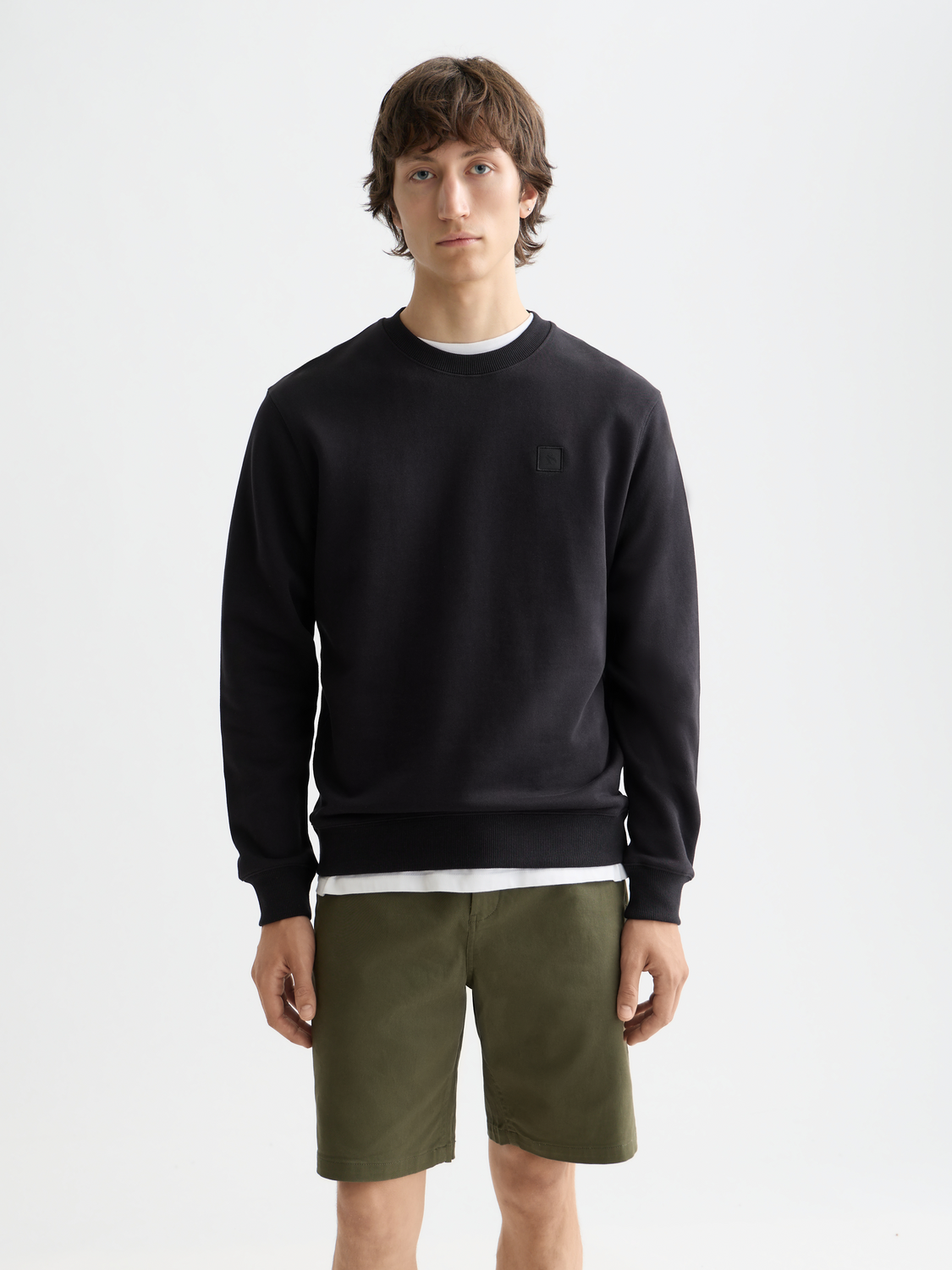 Scotch & Soda logo sweatshirt showing a casual gray sweatshirt with a printed logo on the front.