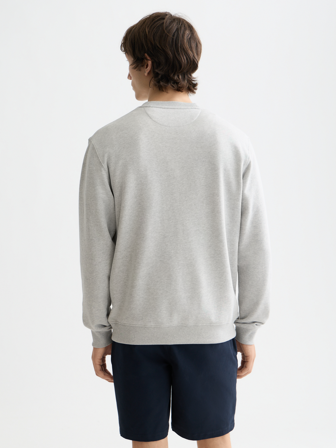 Black logo sweatshirt from SCOTCH & SODA featuring a front logo design and casual fit, shown on a plain background.