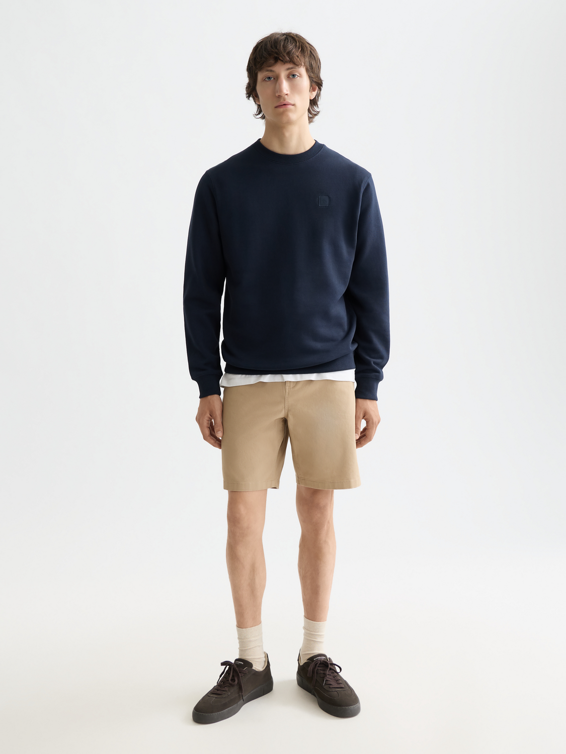 Scotch & Soda logo sweatshirt showing a casual gray sweatshirt with a front logo print and ribbed cuffs.