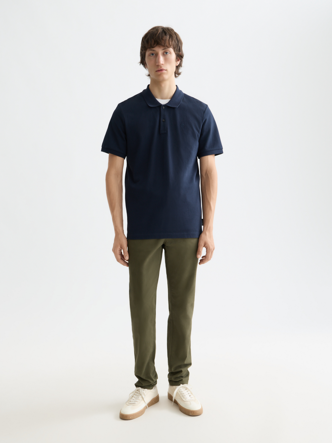 Scotch & Soda logo pique polo shirt featuring a classic collar and short sleeves, displayed on a hanger.