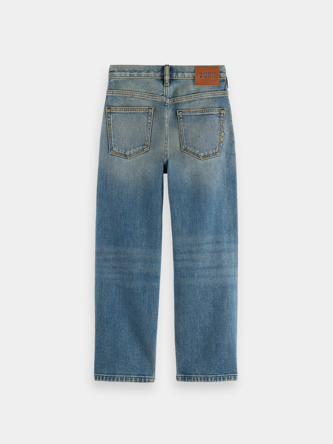 Kids' loose-fit denim jeans by Scotch & Soda, showing dark wash, relaxed fit, and classic five-pocket style.
