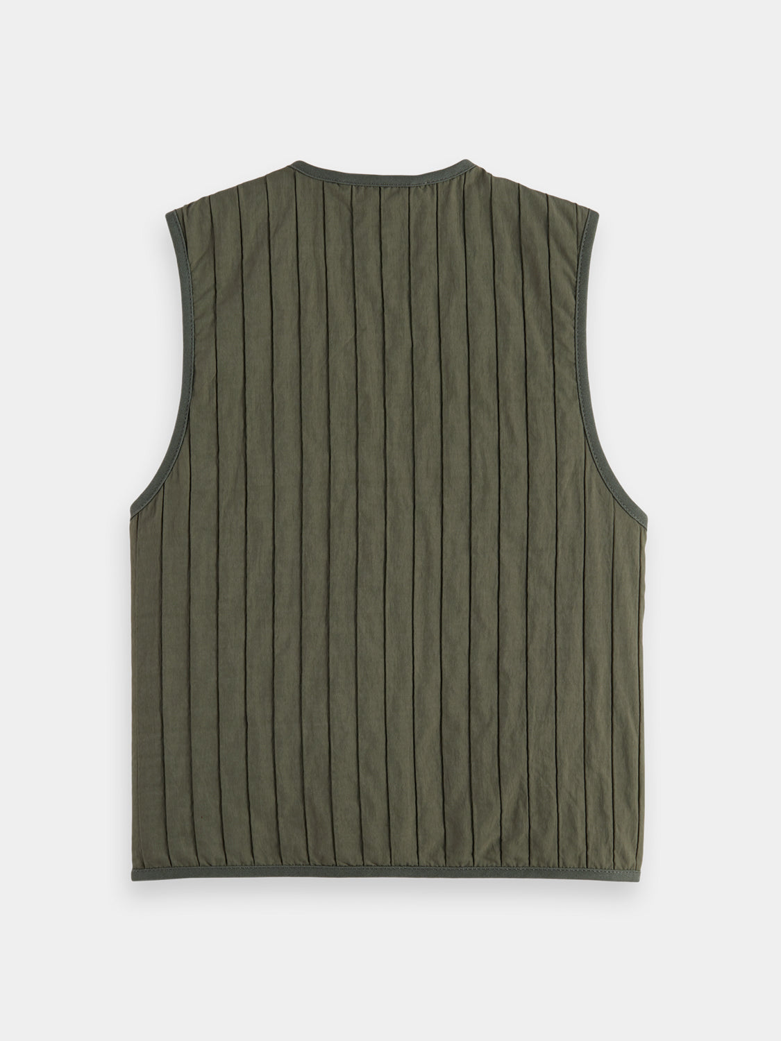 Kids patchwork gilet by Scotch & Soda, featuring colorful fabric patches and a cozy sleeveless design.