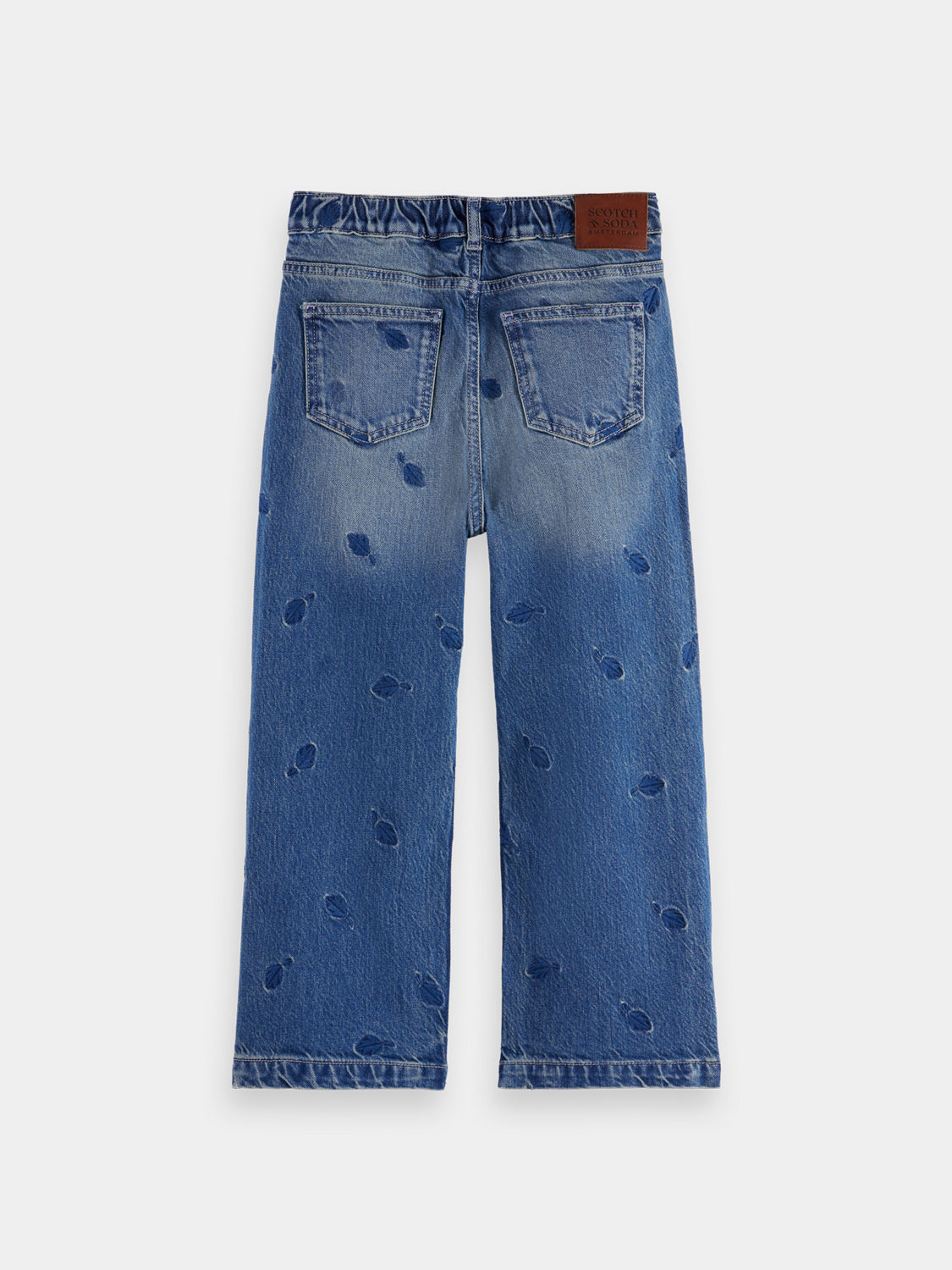 Kids' deep loose-fit denim jeans by Scotch & Soda, showing dark blue denim with relaxed fit and classic five-pocket design.