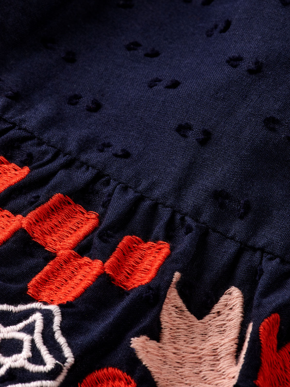 Kids' embroidered skirt by Scotch & Soda, featuring colorful floral embroidery and a playful, lightweight fabric design.