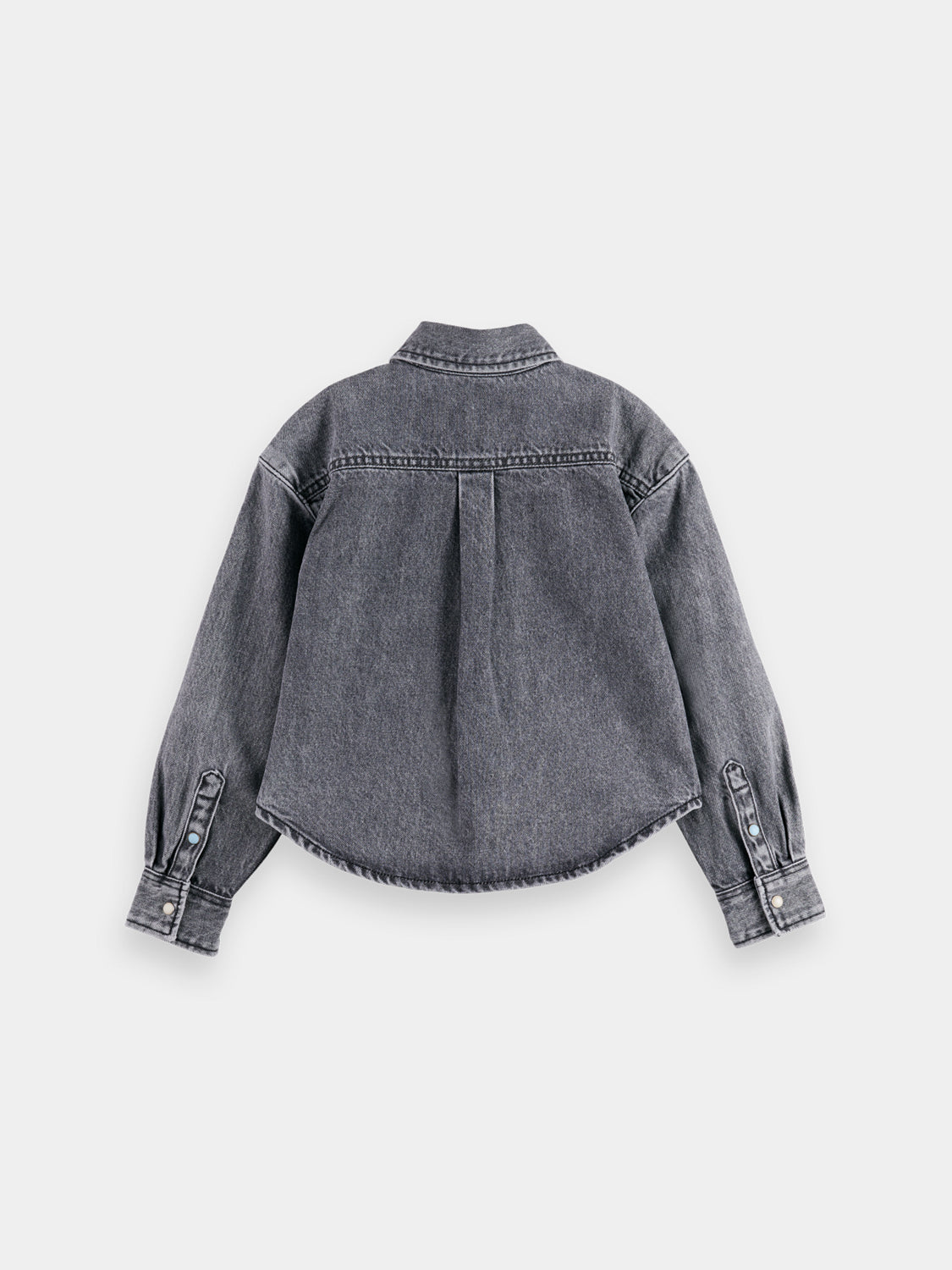 Kids denim overshirt long sleeve shirt by Scotch & Soda, dark blue with button front and chest pockets, rear view.