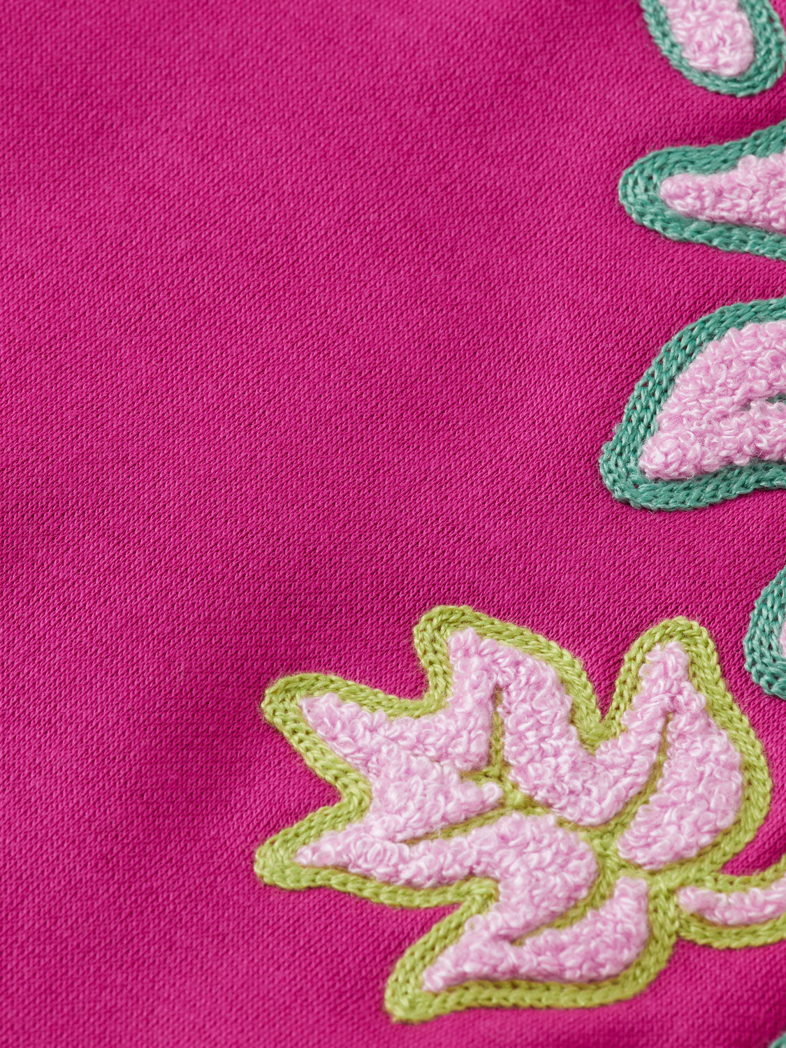 Kids' embroidered sweatshirt by Scotch & Soda, featuring colorful embroidery on a cozy sweats fabric.