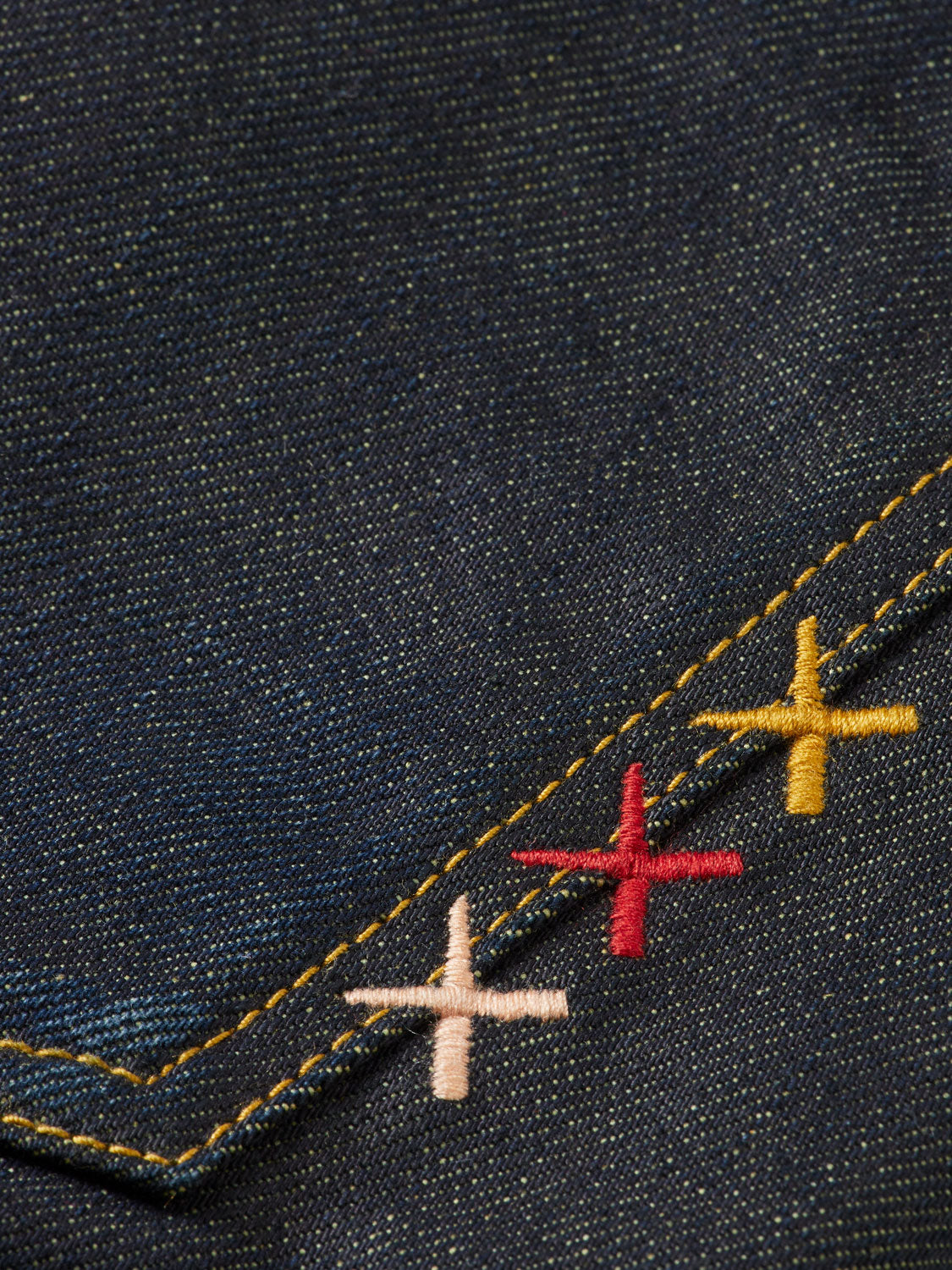 Scotch & Soda Dean tapered denim jeans showing slim fit design and classic blue wash.