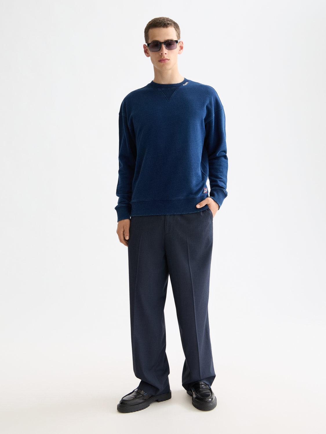 Indigo printed sweatshirt by Scotch & Soda, featuring a stylish design and comfortable fit, shown on a model.