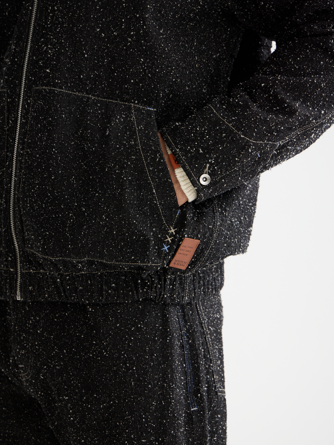 Blue denim jacket by Scotch & Soda, stylish casual jacket with button closures and classic fit, front pockets, and distressed details.