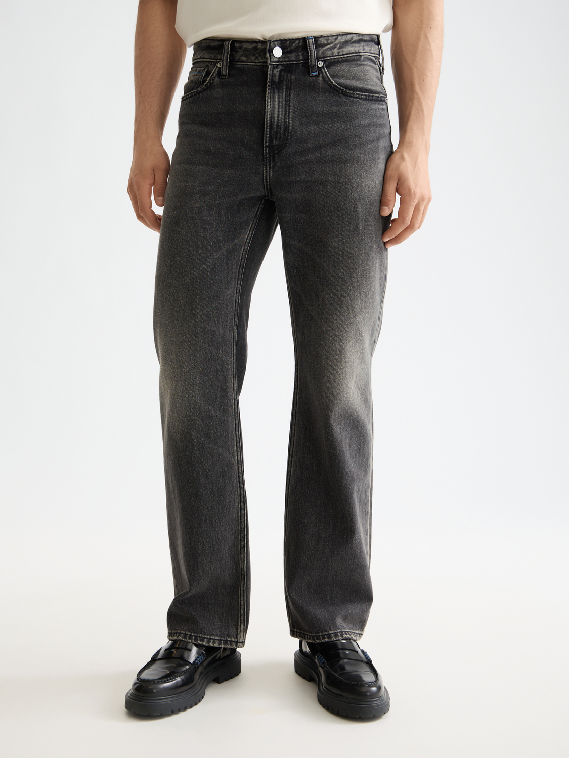 Wide-fit denim jeans by Scotch & Soda featuring a relaxed fit and classic five-pocket design, shown in a front view.