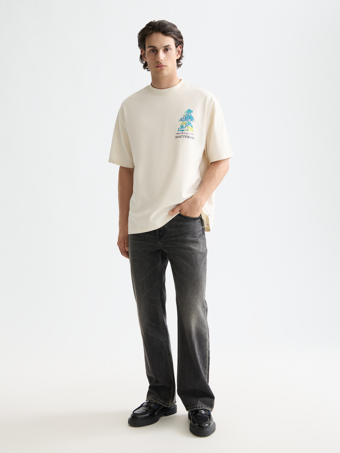Scotch & Soda wide-fit denim jeans with a relaxed fit, classic five-pocket design, and distressed details on the front.