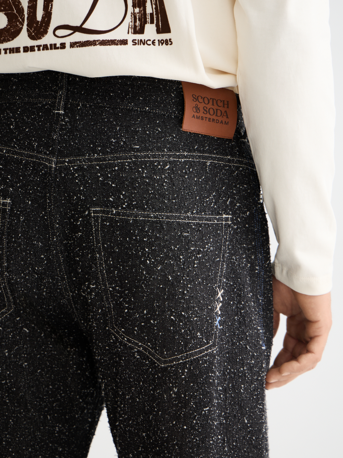 Light blue Scotch & Soda pitch loose-fit denim jeans with distressed details and classic five-pocket design.