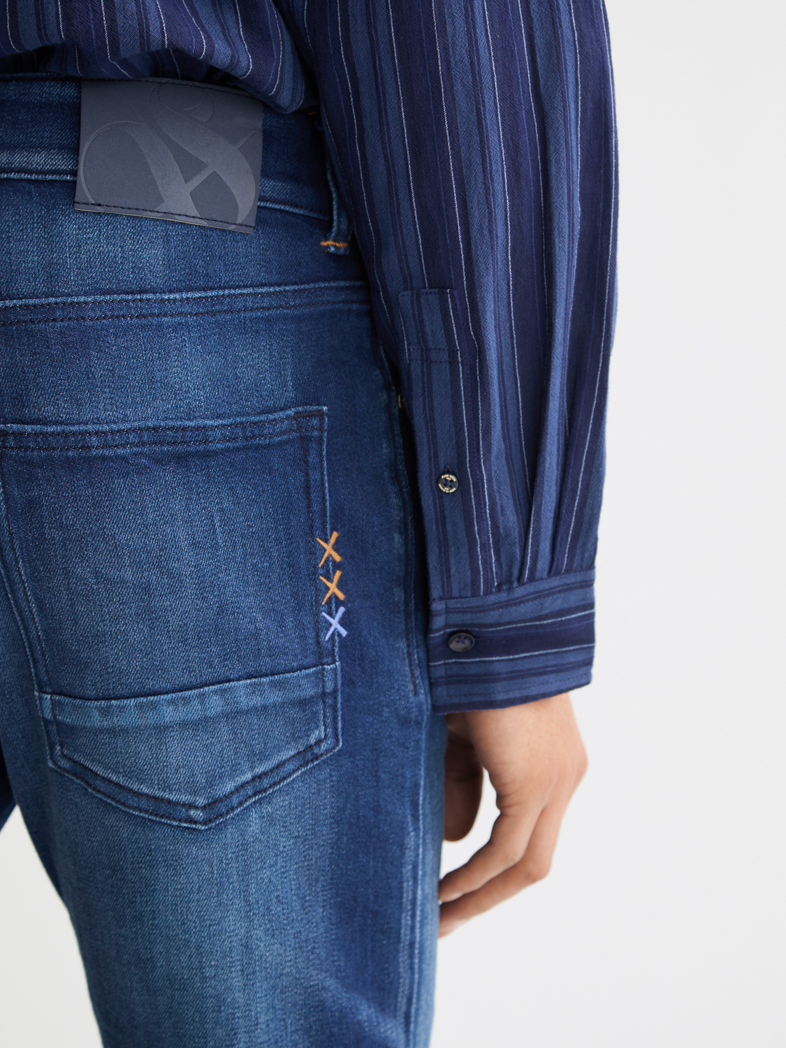 Scarlet blue Scotch & Soda Ralston slim-fit denim jeans with classic five-pocket design and belt loops.