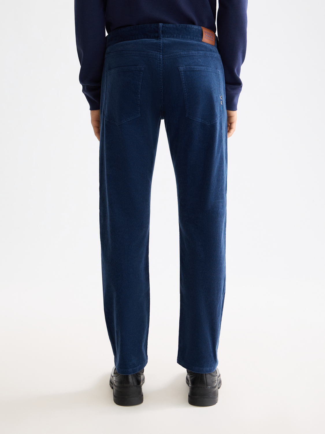 SCOTCH & SODA Zee straight-fit pants in black, showing the rear view with a tailored fit and classic design.