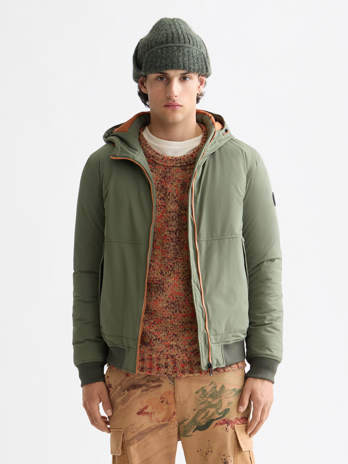 SCOTCH & SODA hooded softshell jacket in navy, showcasing front view with adjustable hood and zipper closure.