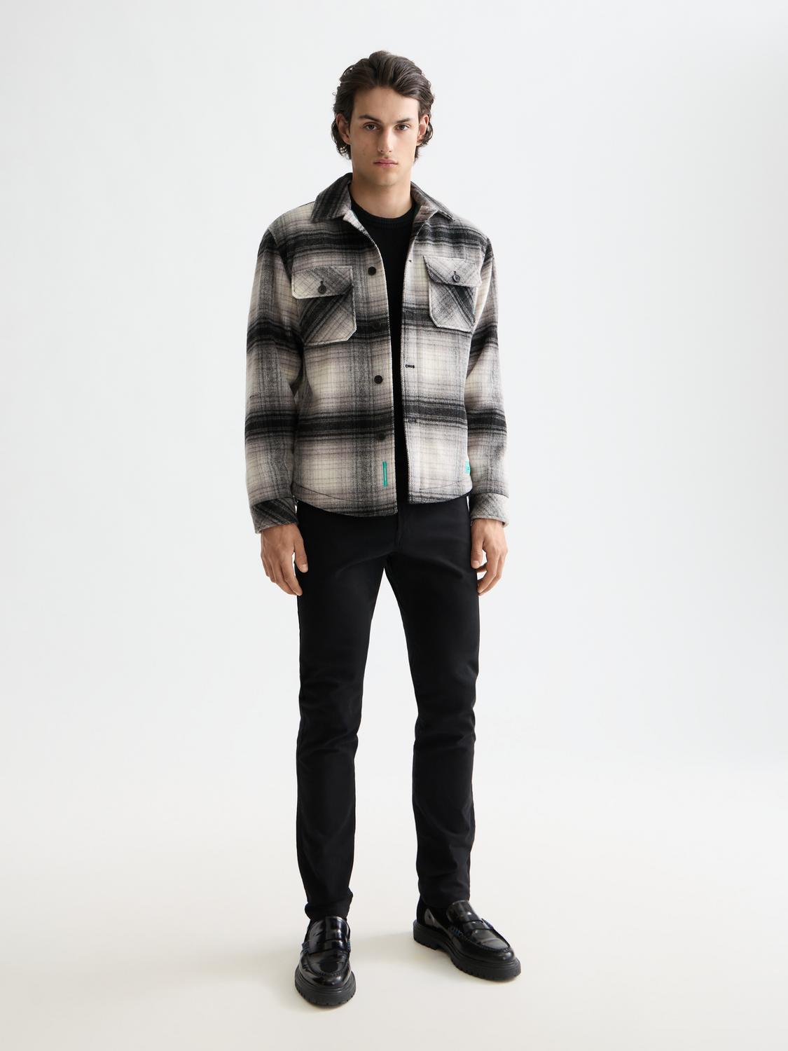 Scotch & Soda check overshirt jacket with button closure, featuring a classic plaid pattern in neutral tones.