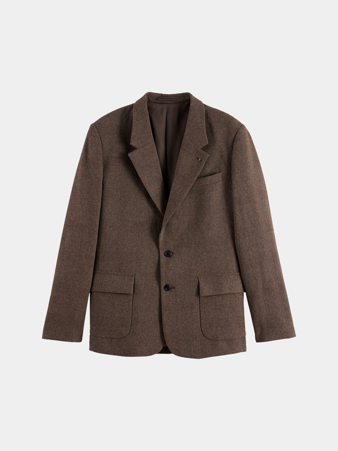 Yarn-dyed blazer by Scotch & Soda featuring a tailored fit, classic lapels, and a stylish pattern, shown on a model.