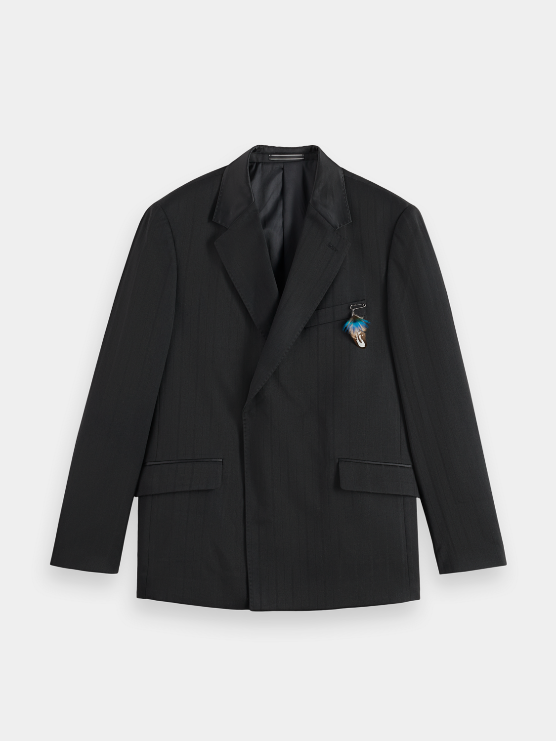 SCOTCH & SODA double-breasted blazer in navy with structured lapels and button details, displayed on a hanger.
