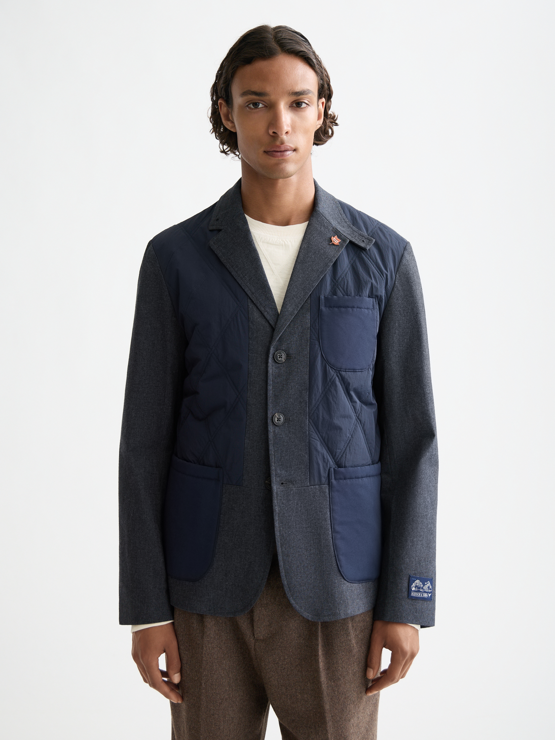 Colourblock padded blazer from Scotch & Soda, stylish men's blazer with vibrant color blocks and padded design.