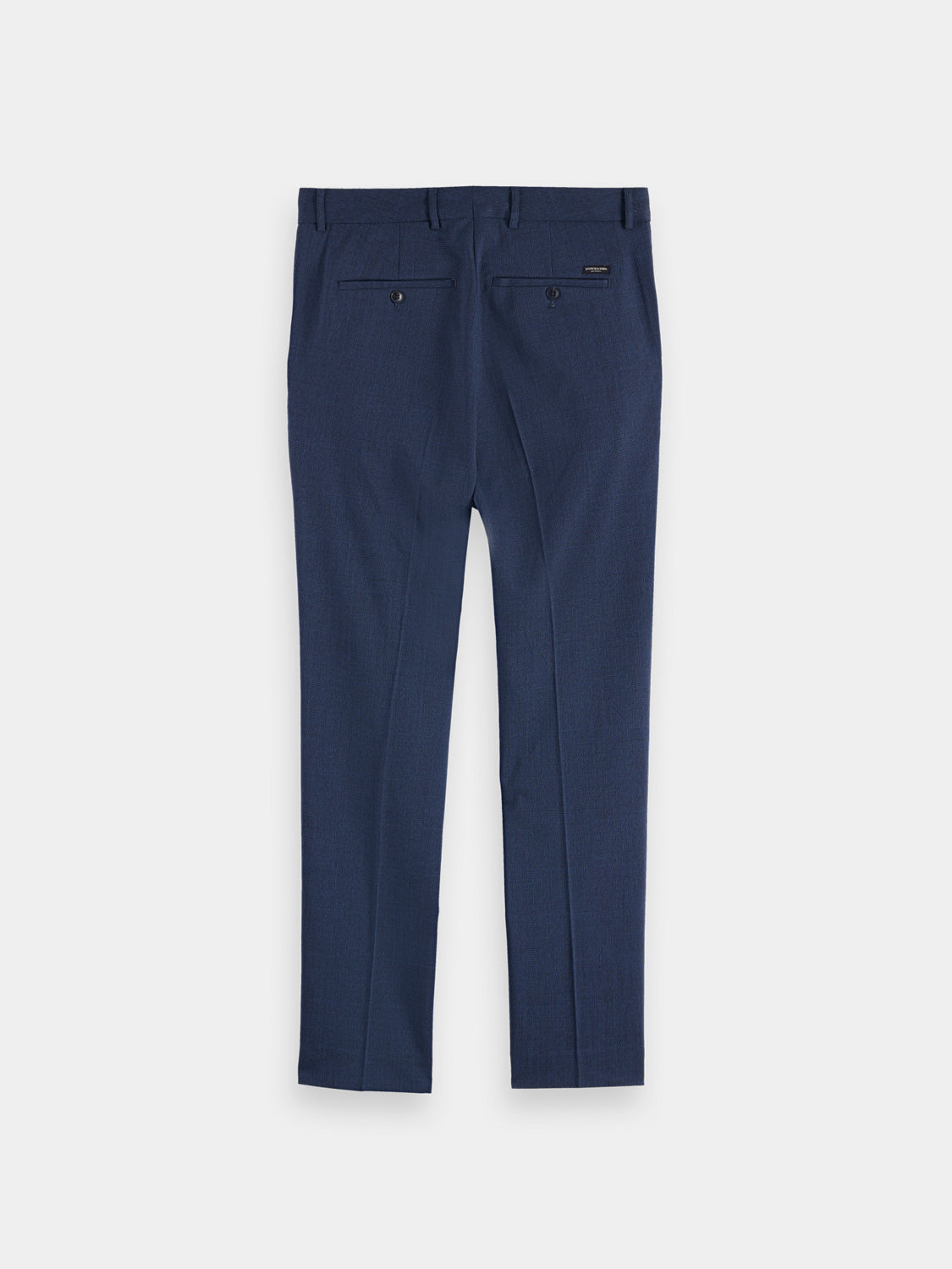 Dark brown Irving tapered chinos pants by Scotch & Soda displayed on a model.