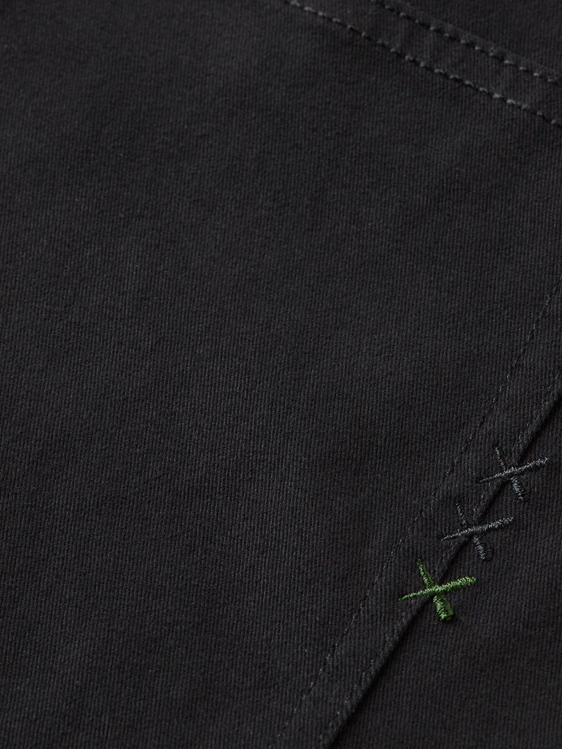 Slim-fit Ralston 5-pocket pants by Scotch & Soda, shown in dark wash with classic pocket details.