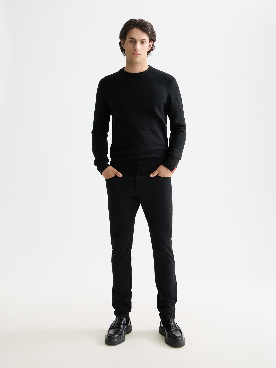 SCOTCH & SODA Ralston slim-fit 5-pocket pants shown on a model, featuring a modern cut and classic pocket design.