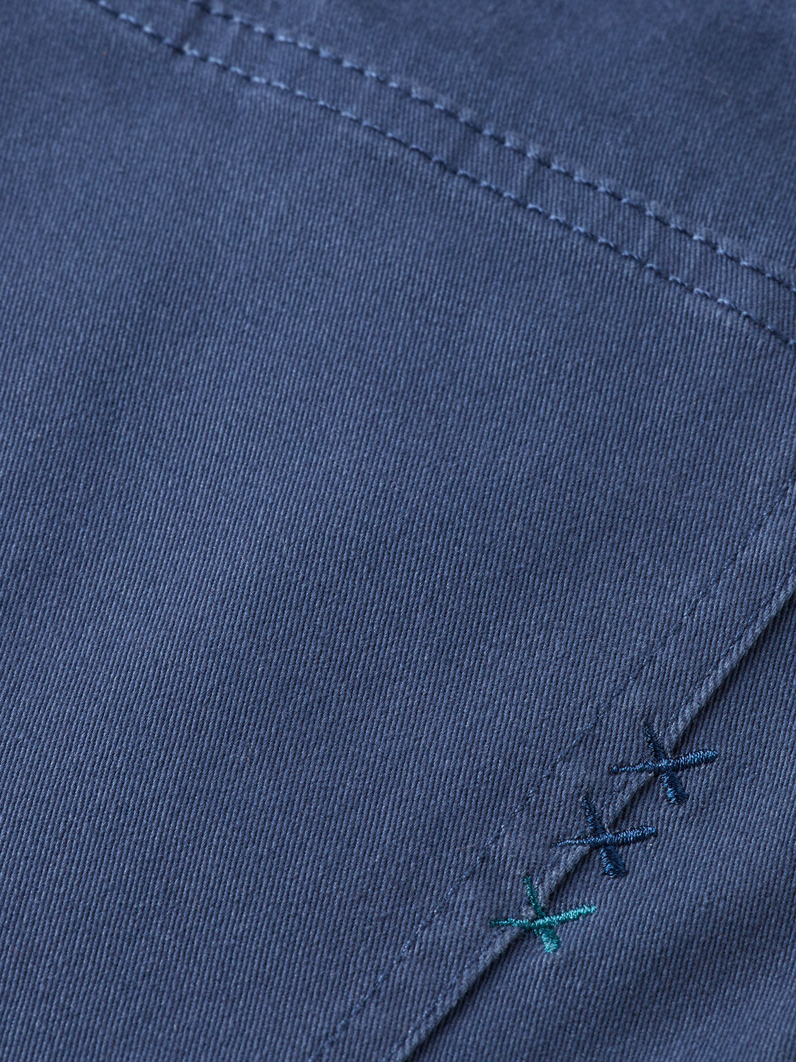 SCOTCH & SODA Ralston slim-fit 5-pocket pants in dark denim, shown on a model with a casual style.