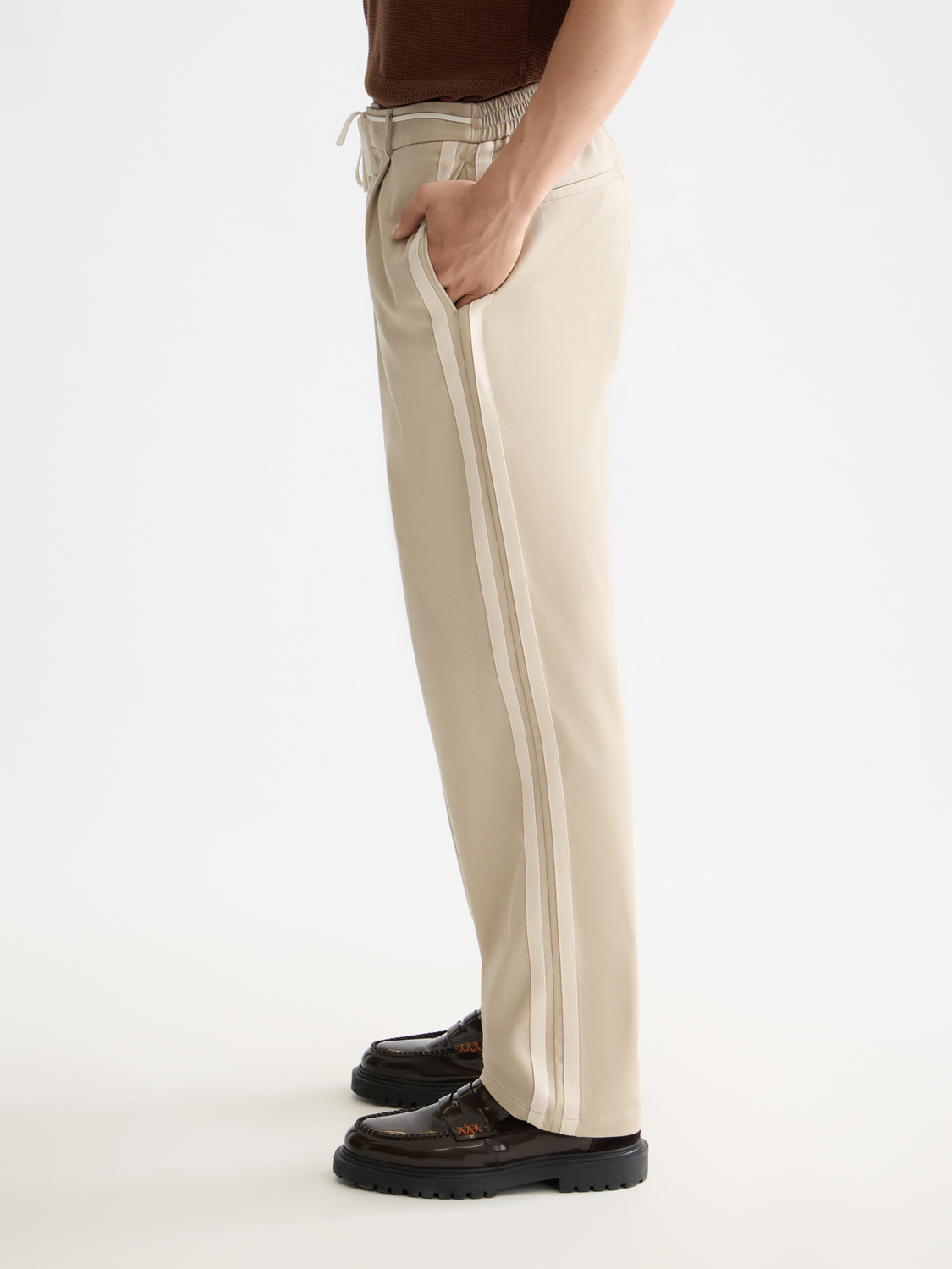 Pleated straight-fit jogger pants by Scotch & Soda, featuring a stylish design and tailored fit, shown in the product image.