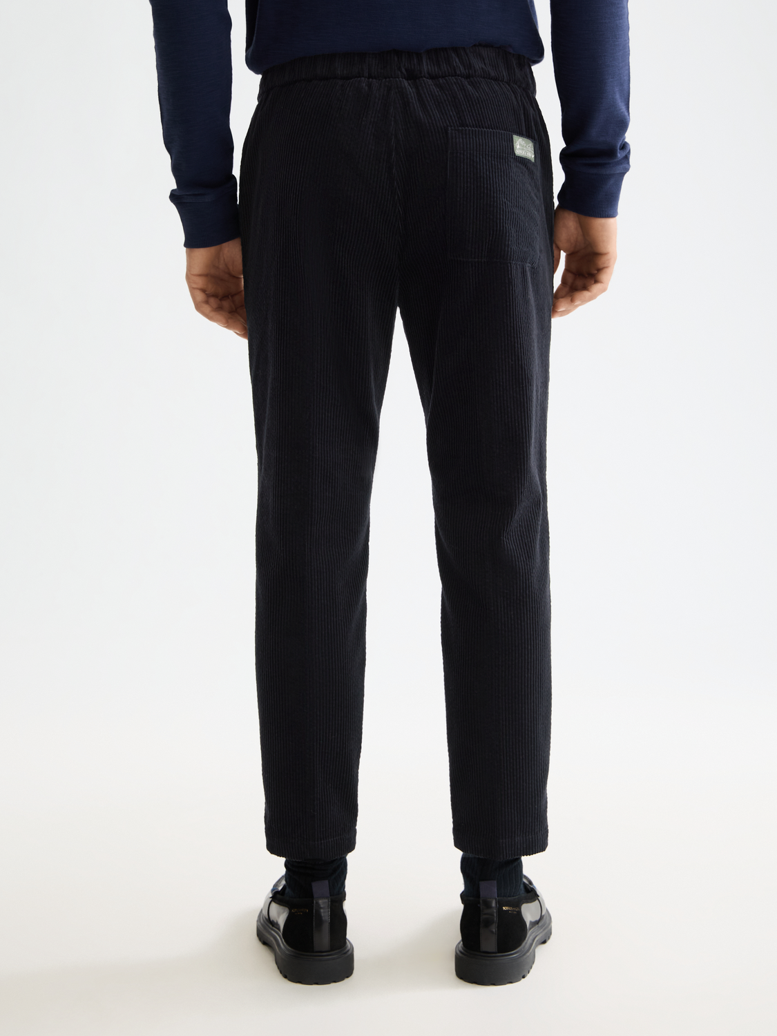 SCOTCH & SODA Fave joggers, stylish casual pants with a relaxed fit, shown from the back in this image.