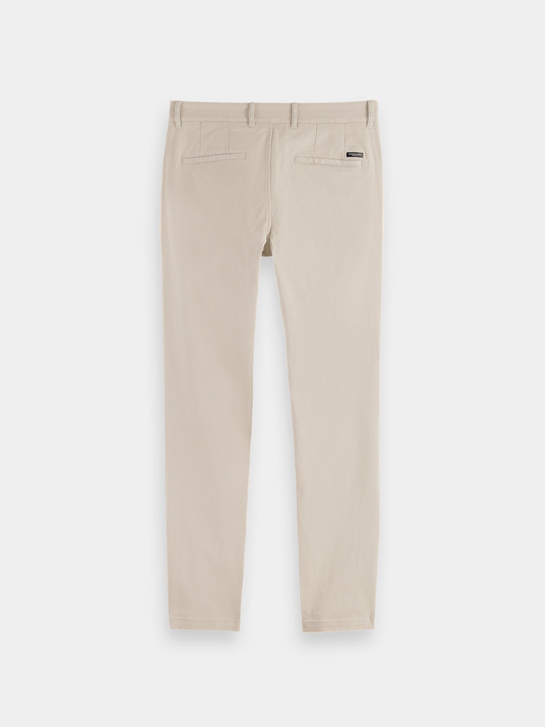 Dark blue Scotch & Soda Mott slim-fit chinos pants displayed from the back view, showing tailored fit and clean stitching.