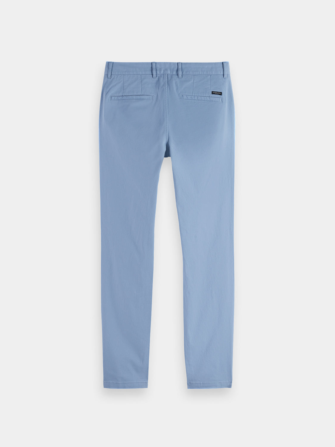 Dark blue Mott slim-fit chinos by Scotch & Soda, showing the tailored pants with front pockets and belt loops.