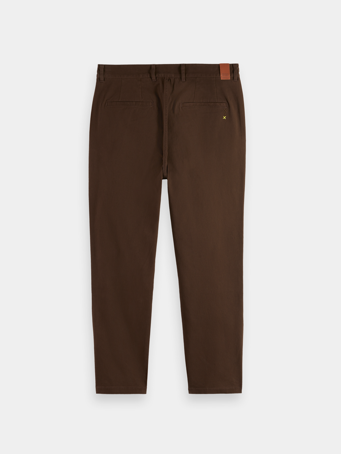 Dark blue Scotch & Soda Drift tapered chinos pants with back pockets, showcasing a stylish fit and tapered design.