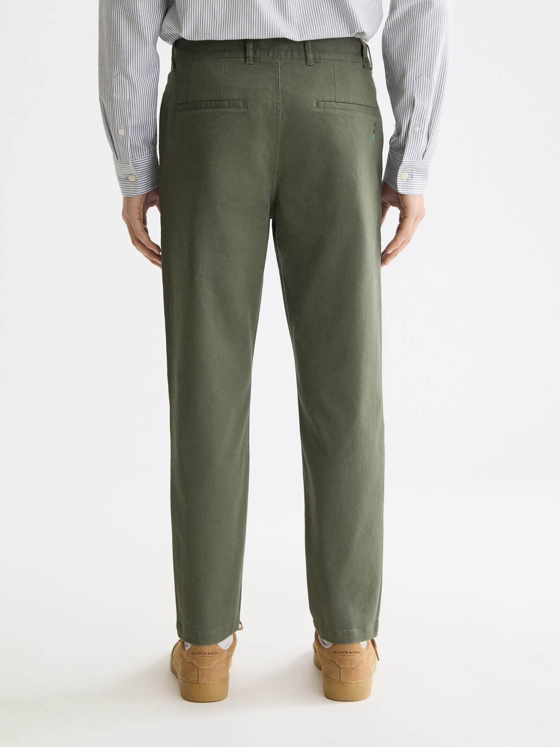 SCOTCH & SODA Drift tapered chinos pants shown from the back, featuring a relaxed fit and classic tapered design in neutral fabric.