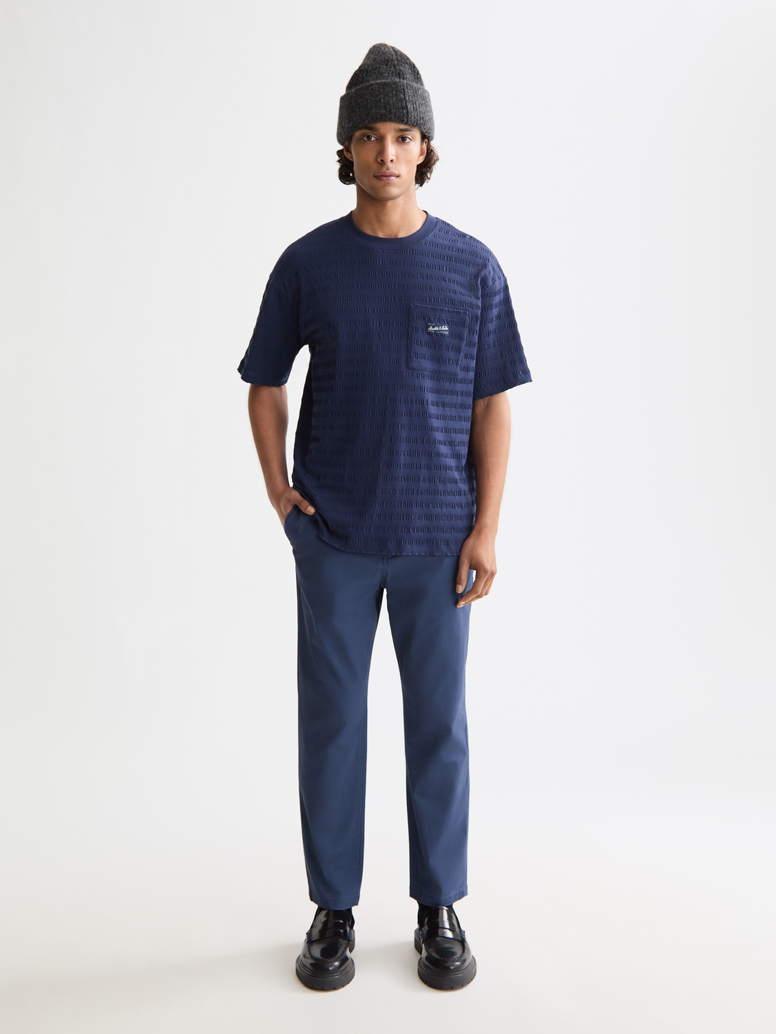 Scotch & Soda Drift tapered chinos pants in a neutral color, featuring a slim fit and classic pocket design.