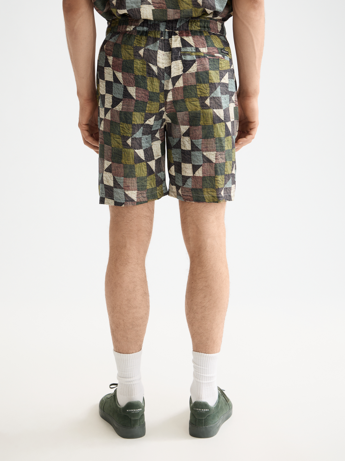 Fave printed shorts by Scotch & Soda featuring a colorful floral pattern and relaxed fit, shown in front view.